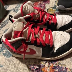 Boys Jordan’s mid red black and white sneakers